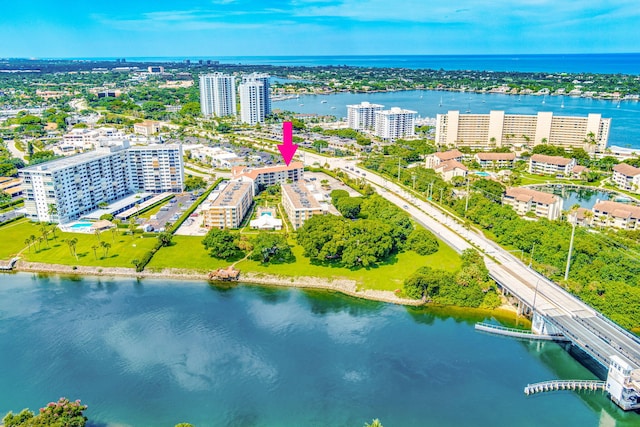 aerial view featuring a water view and a city view