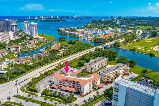 aerial view featuring a water view and a city view