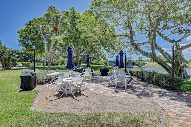 view of patio / terrace with a water view