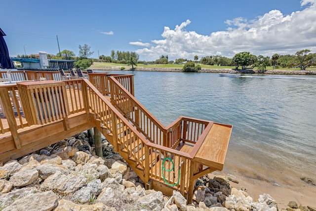 dock area with a water view