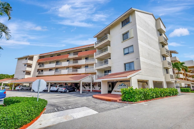 view of property with covered parking