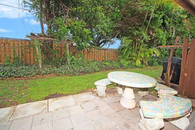 view of patio / terrace featuring a grill