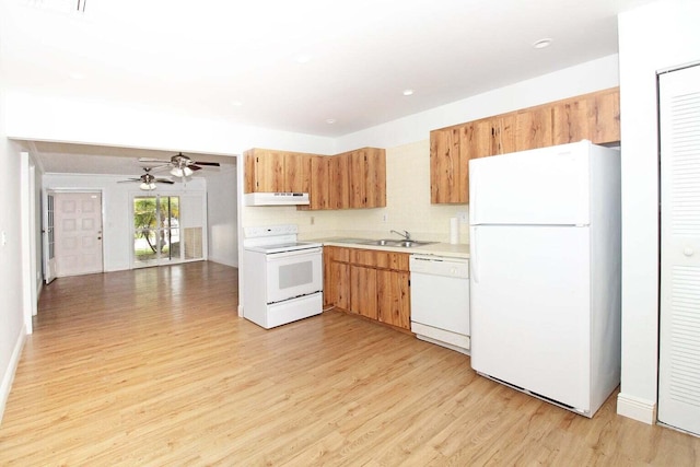 kitchen featuring light hardwood / wood-style flooring, white appliances, sink, ventilation hood, and ceiling fan