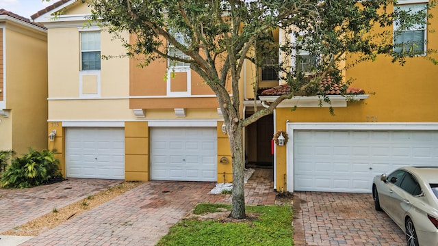 view of front of home with a garage