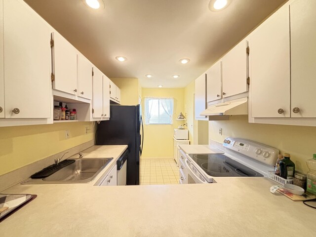 kitchen with white cabinets, light tile patterned floors, white appliances, and sink