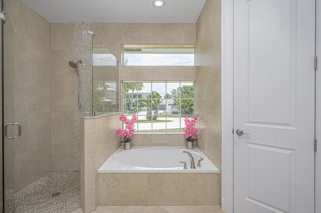 bathroom with independent shower and bath