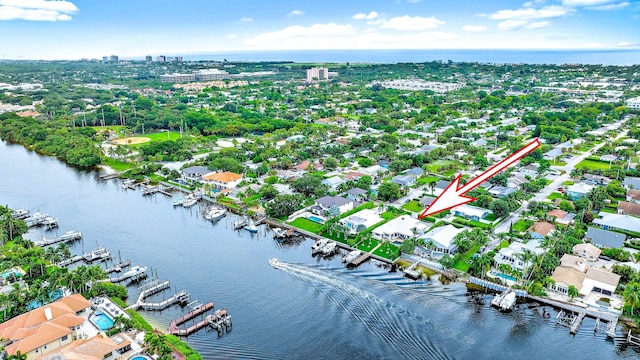 drone / aerial view with a water view