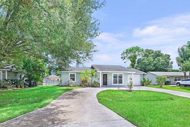 ranch-style home featuring a front yard and a garage