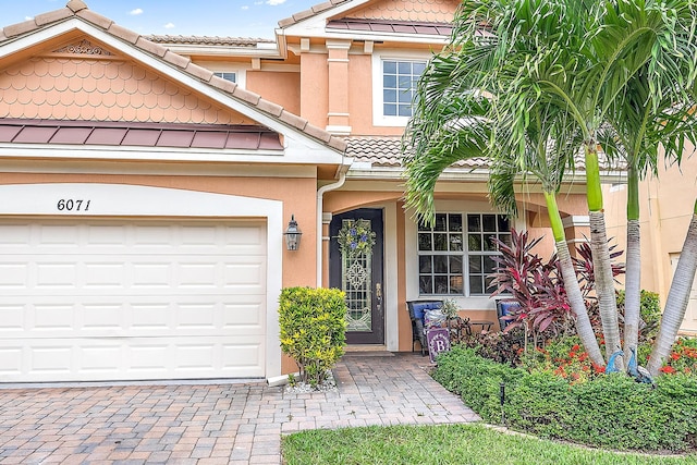 view of front of property featuring a garage