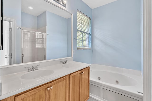 bathroom with a bathing tub and dual bowl vanity