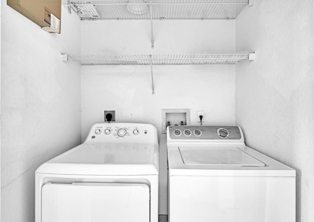 laundry room featuring independent washer and dryer