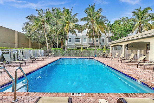 view of swimming pool featuring a patio