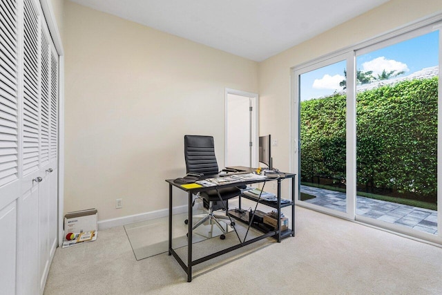 home office featuring light colored carpet