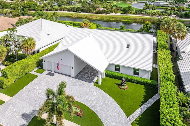 birds eye view of property featuring a water view