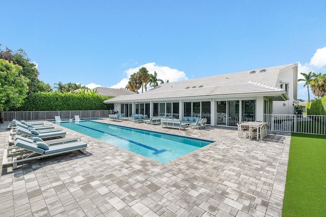 view of pool featuring a patio