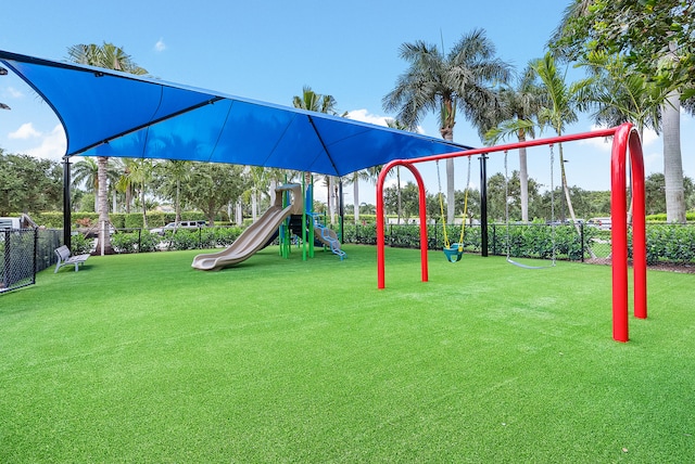 view of play area featuring a lawn