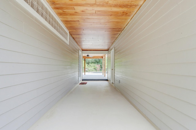 hall featuring wood ceiling