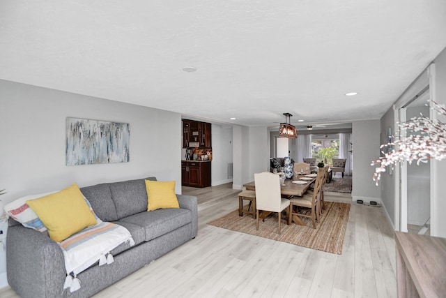 living room with light wood-type flooring