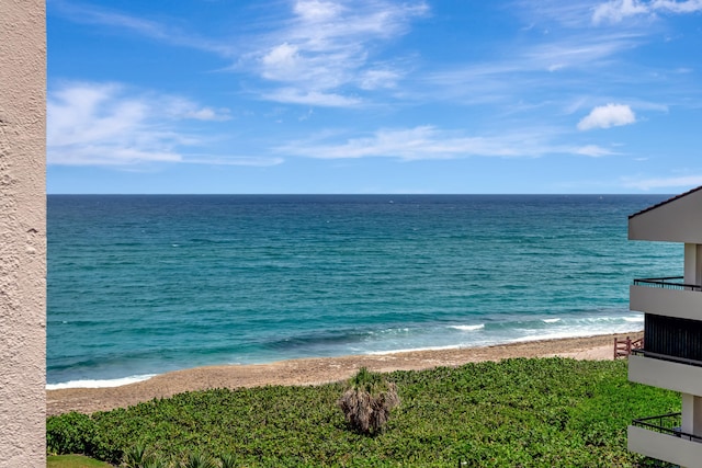 property view of water featuring a beach view