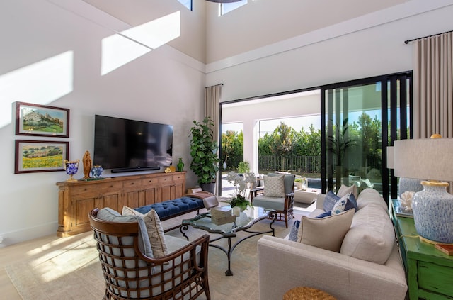 living room with a high ceiling