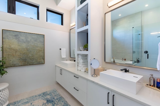 bathroom featuring double vanity