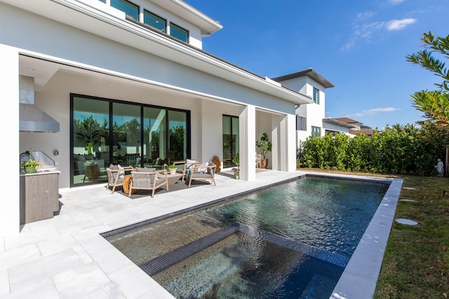 exterior space featuring an outdoor living space and a patio area