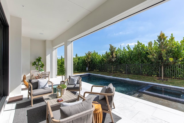 view of pool featuring an in ground hot tub, a patio, and an outdoor hangout area