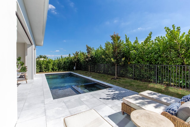 view of swimming pool featuring a patio area