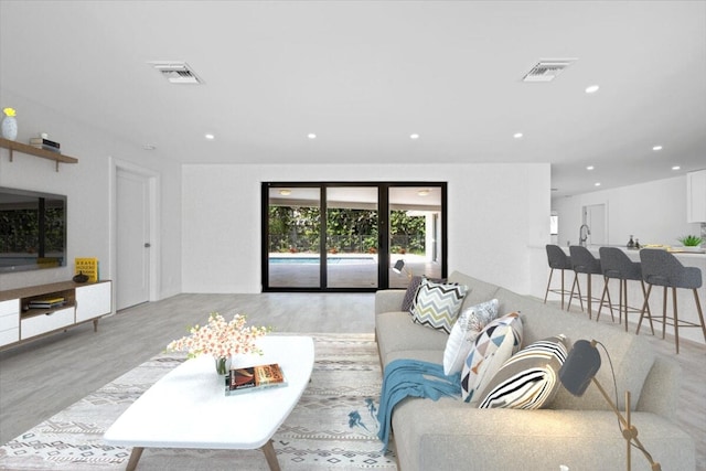 living room featuring light hardwood / wood-style floors