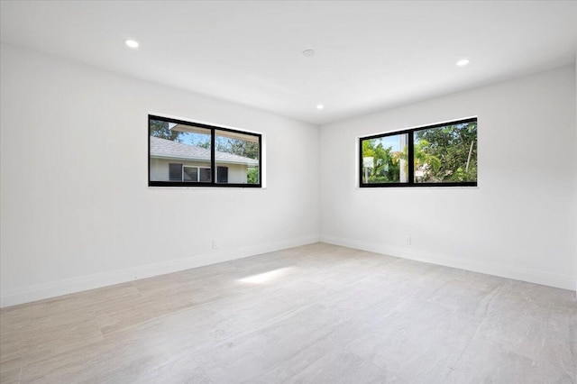 empty room featuring plenty of natural light