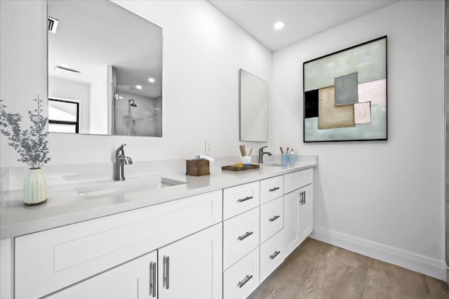 bathroom featuring hardwood / wood-style floors, vanity, and walk in shower