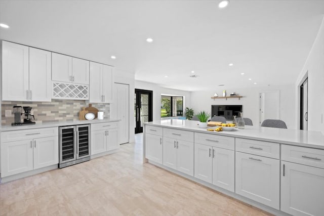 kitchen with white cabinets and wine cooler