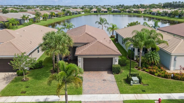 bird's eye view with a water view