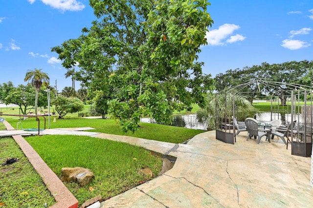 view of patio / terrace featuring a water view