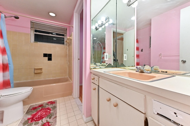 full bathroom featuring vanity, shower / bath combination with curtain, toilet, and tile patterned floors