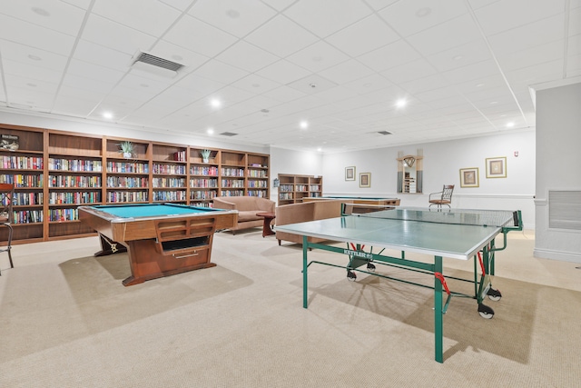 rec room featuring built in shelves, billiards, and light colored carpet