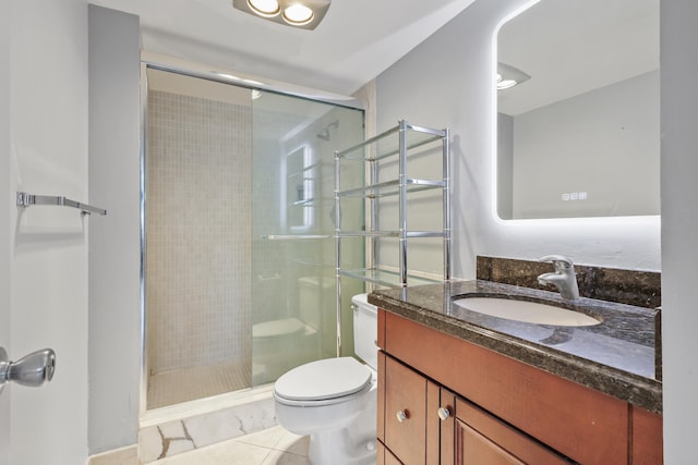 bathroom featuring a shower with door, toilet, tile patterned floors, and vanity