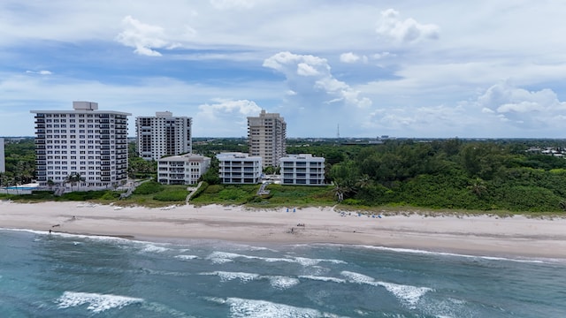 aerial view featuring a water view and a view of the beach