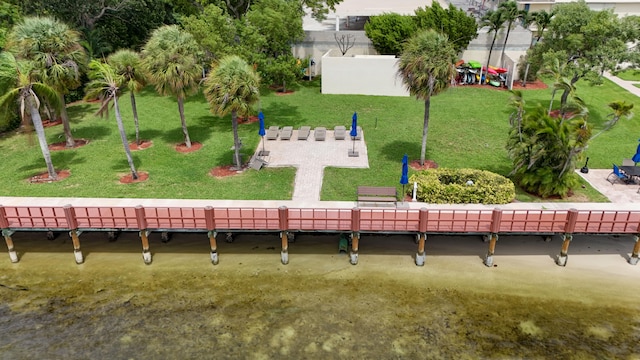 view of community featuring a lawn