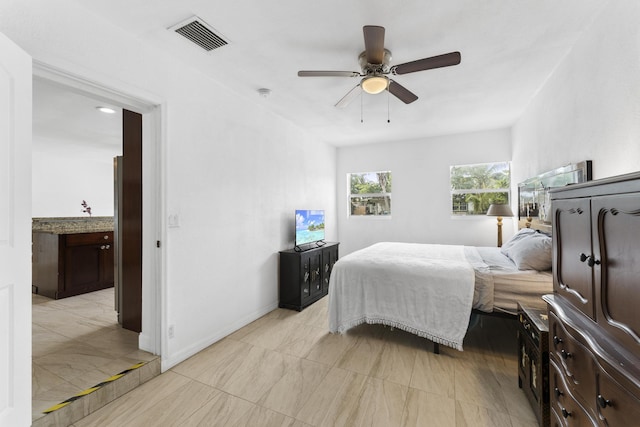 tiled bedroom with ceiling fan