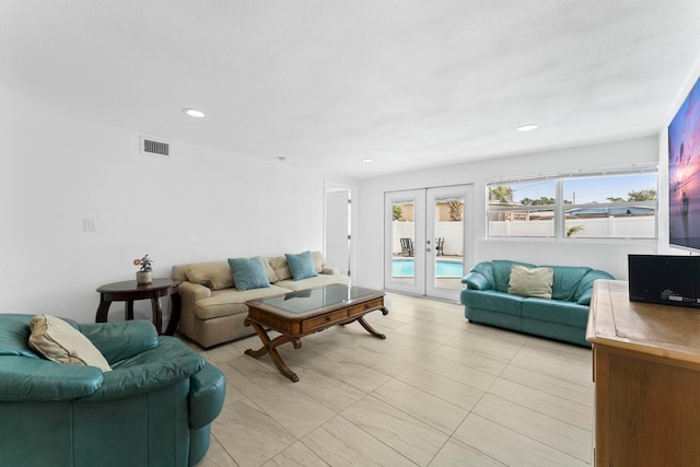 tiled living room with french doors