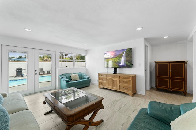 living room with light tile patterned flooring and french doors