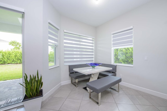 dining room featuring light tile patterned floors