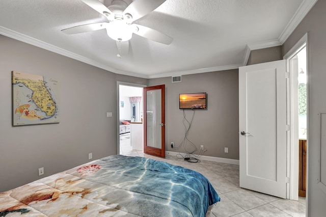 bedroom with light tile patterned flooring, ceiling fan, crown molding, and a textured ceiling