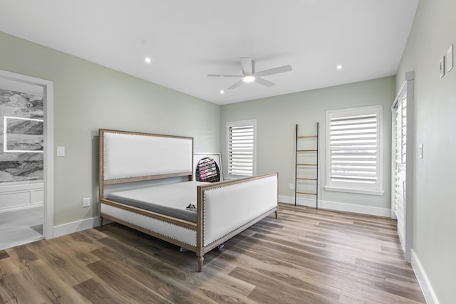 bedroom with recessed lighting, ceiling fan, baseboards, and wood finished floors