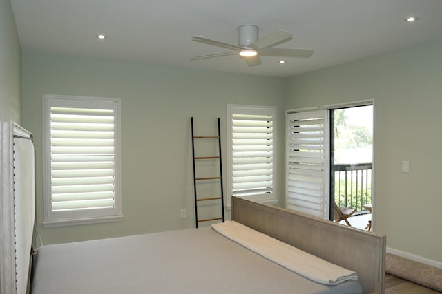 bedroom with access to outside, ceiling fan, and recessed lighting