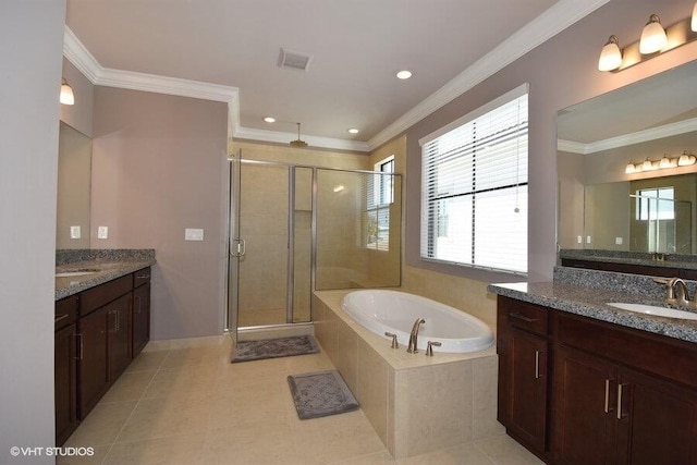 bathroom with separate shower and tub, crown molding, dual bowl vanity, and tile patterned floors