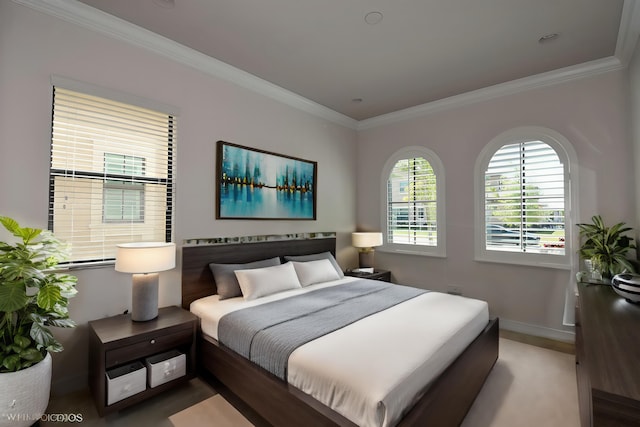 bedroom with ornamental molding