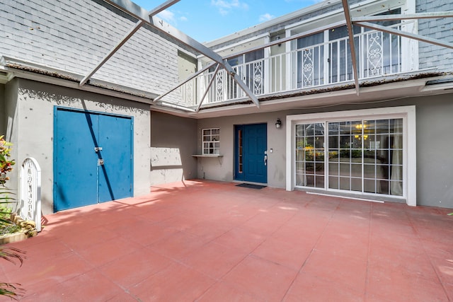 view of patio / terrace featuring a balcony