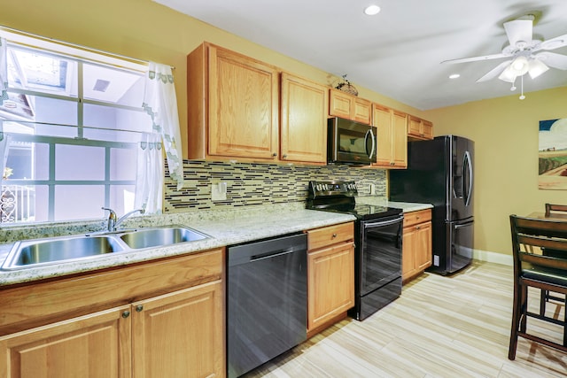 kitchen with black appliances, tasteful backsplash, a wealth of natural light, and ceiling fan